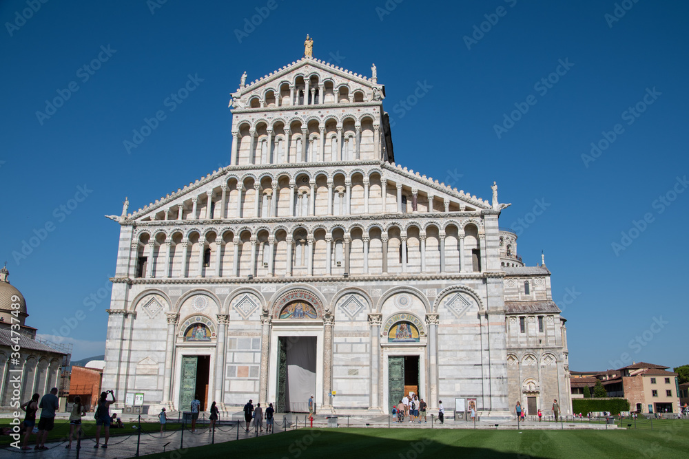 Pisa Cathedral  is a medieval Roman Catholic cathedral dedicated to the Assumption of the Virgin Mary, in the Piazza dei Miracoli in Pisa, Italy