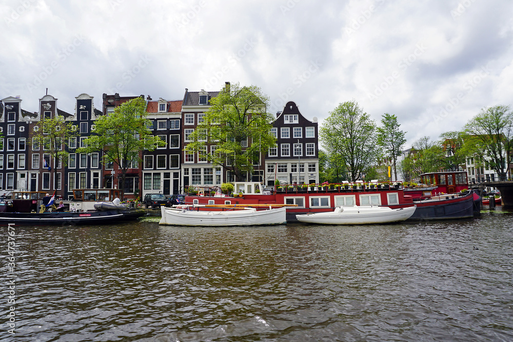 Obraz premium Holland, Amsterdam, city views, navigation channels and monuments