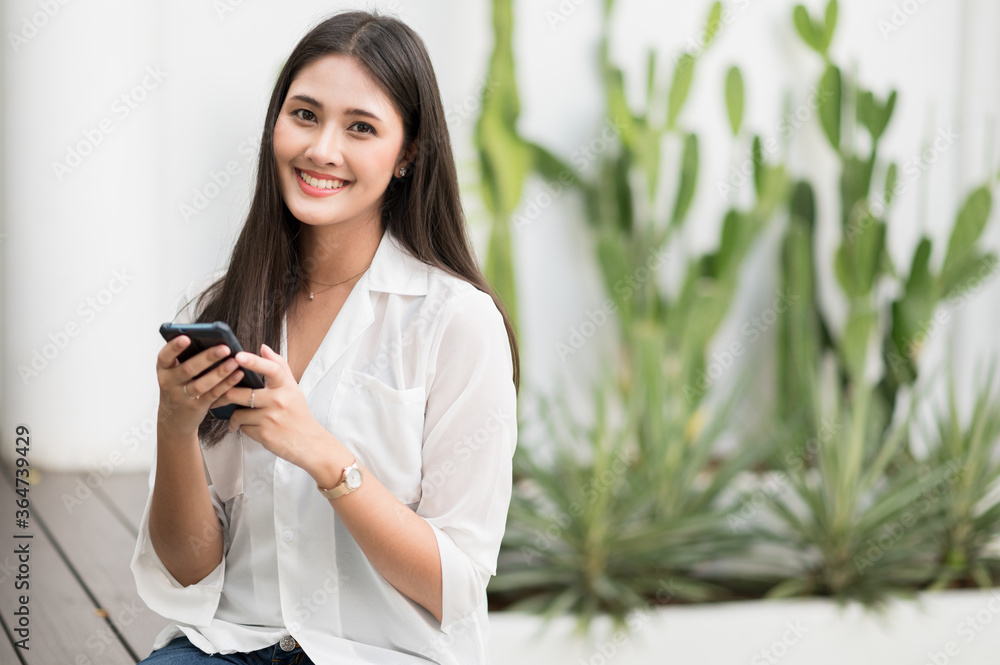 Young asian beautiful women using smartphone . Young asian beautiful women using smartphone .