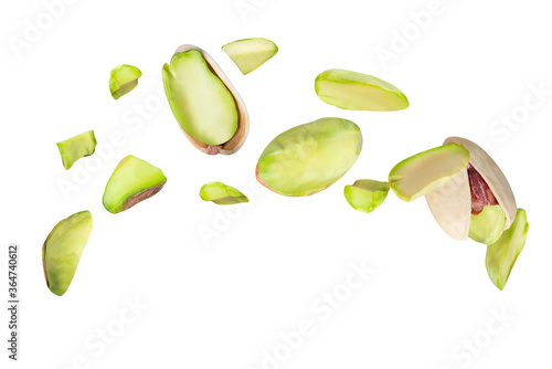 pistachio piece spread on the air  isolated on white background clipping path, full depth of field