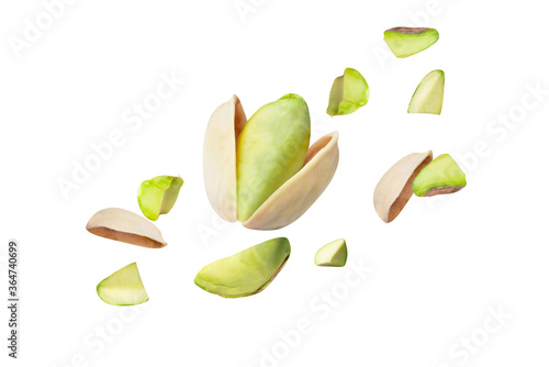 pistachio piece spread on the air  isolated on white background clipping path, full depth of field