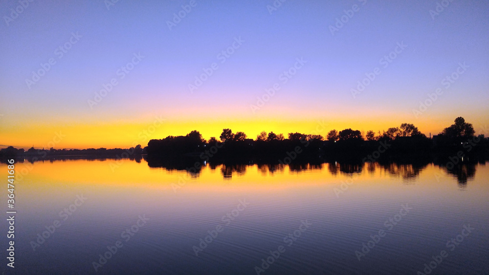 Obraz premium Forest lake at sunset
