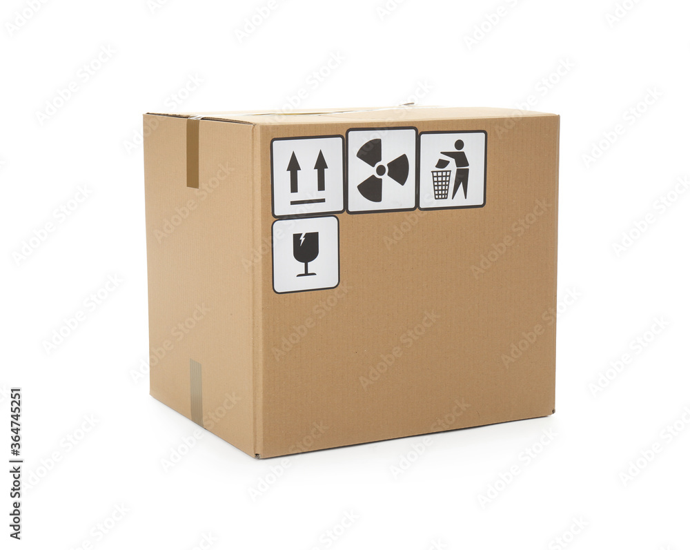 Cardboard box with different packaging symbols isolated on white. Parcel delivery Cardboard box with different packaging symbols isolated on white. Parcel delivery