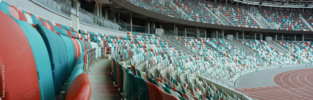 Fototapeta premium WIDE View of empty stadium seats before game or during Coronavirus COVID-19 pandemic
