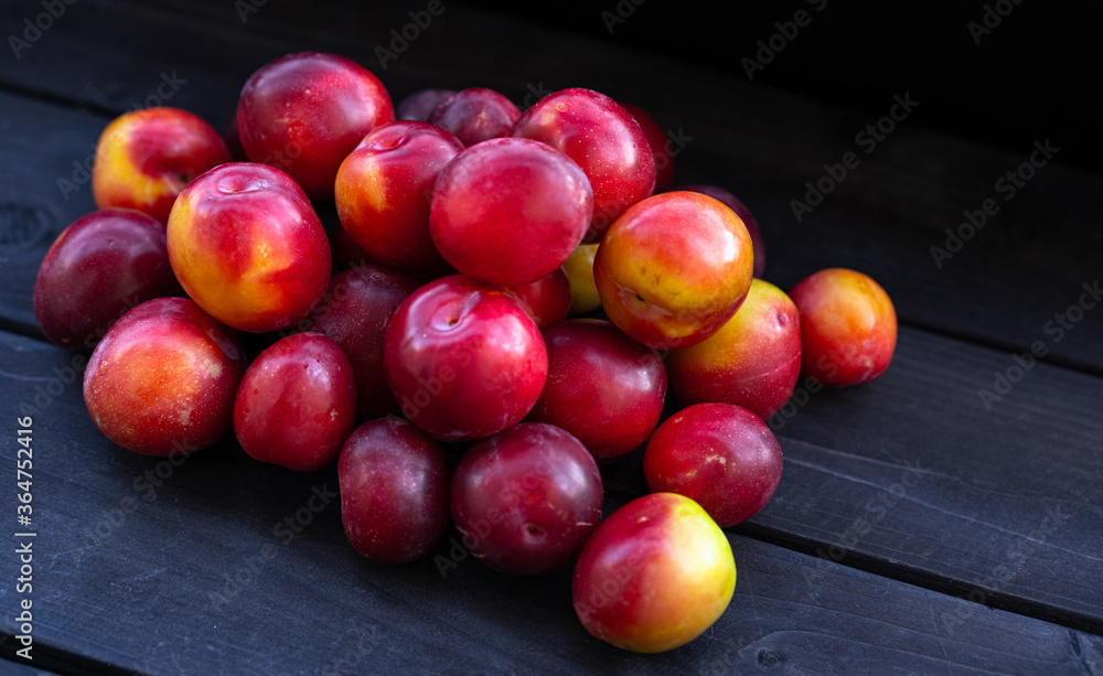 Cherry plum on a wooden background Cherry plum on a wooden background