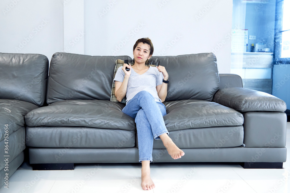 Woman at home watching tv