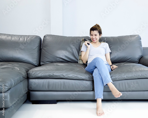 Woman at home watching tv