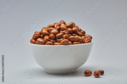 Foto Fava beans (foul) shot on white background.