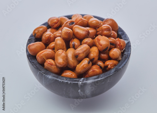 фотографія Fava beans (foul) shot on white background.