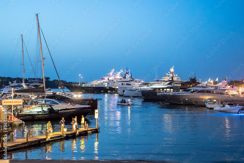 Luxury yachts moored in Porto Cervo Luxury yachts moored in Porto Cervo