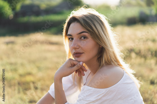 Slika na platnu Portrait happy attractive woman in outdoors