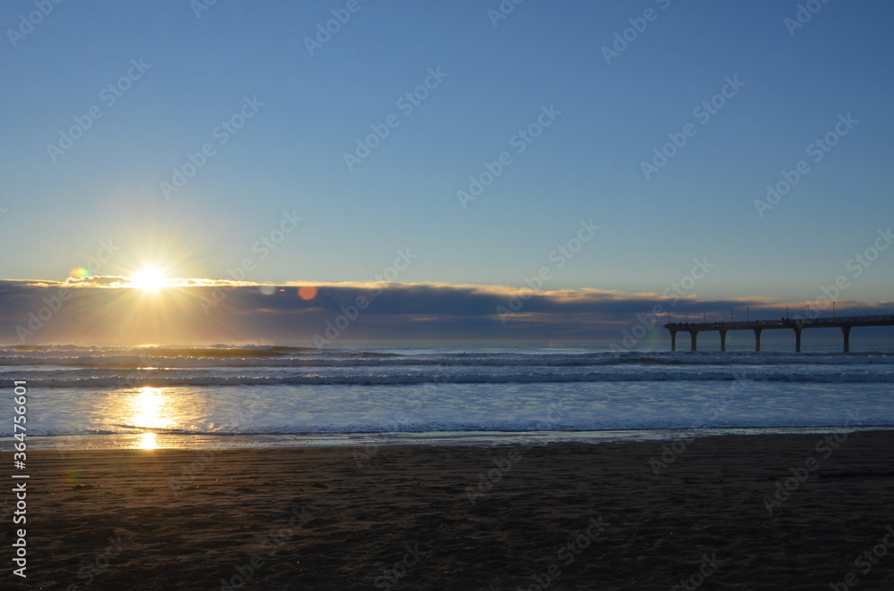 New Brighton Beach is a best spot to visit for sunrise and play amongst the waves under the pier or maybe take a stroll along the top and watch the fishermen.