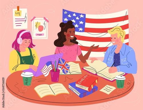 Three happy students learning American and British English together at a table during an interactive group class in a modern school