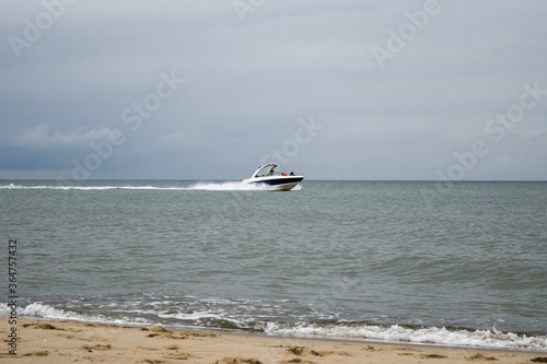 White speedboat in the waters of the Baltic Sea