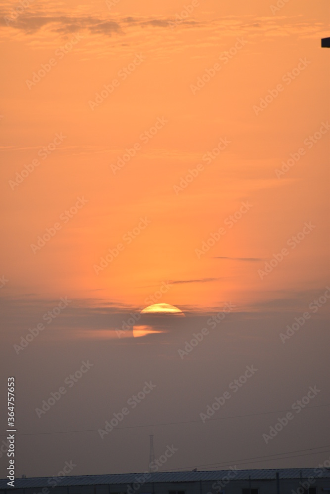 Fototapeta premium View of the sun during sunset.
