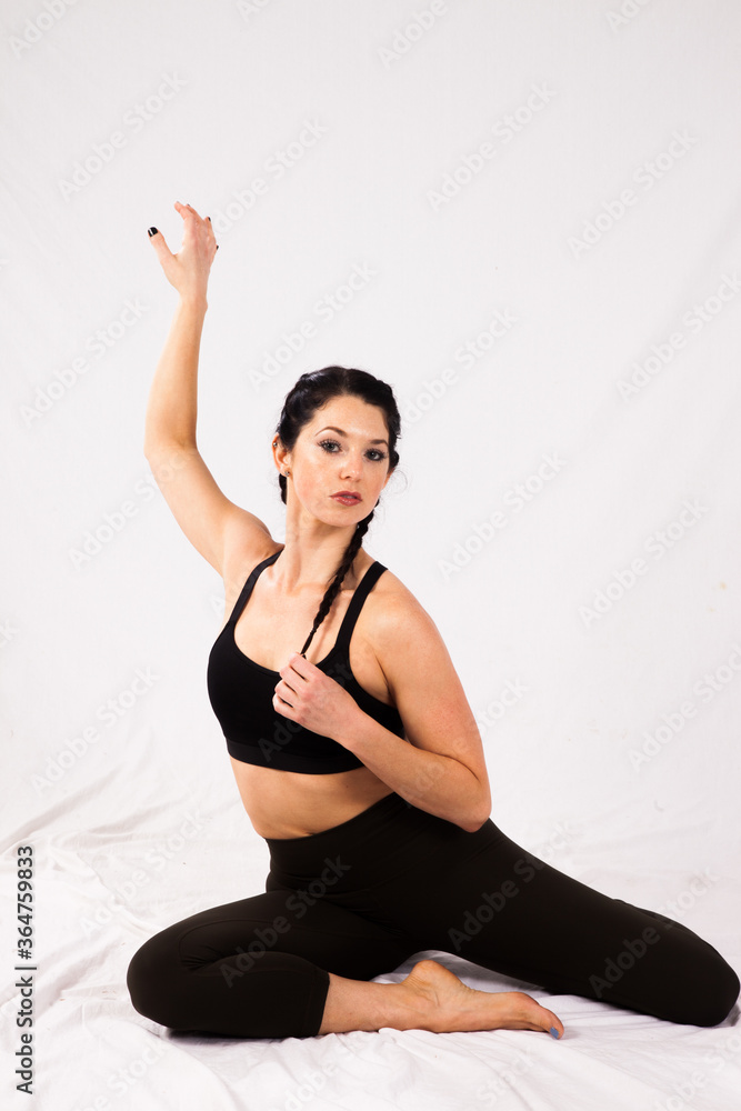 Beautiful woman sitting on the floor