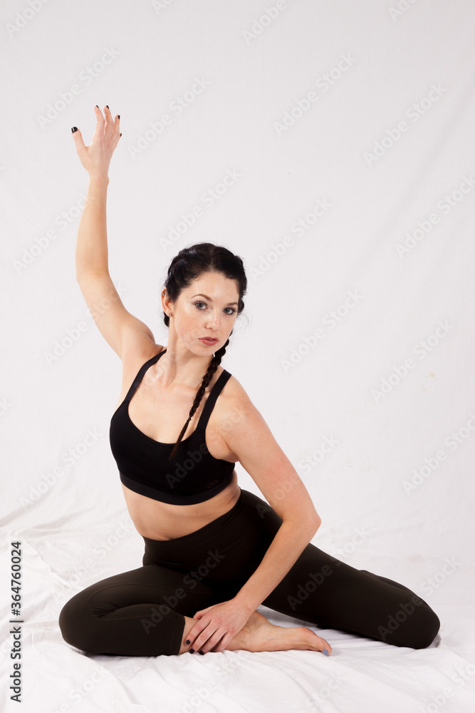 Beautiful woman sitting on the floor Beautiful woman sitting on the floor