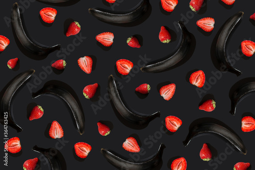 Stylish pattern of black bananas and strawberries. Background for sex shops