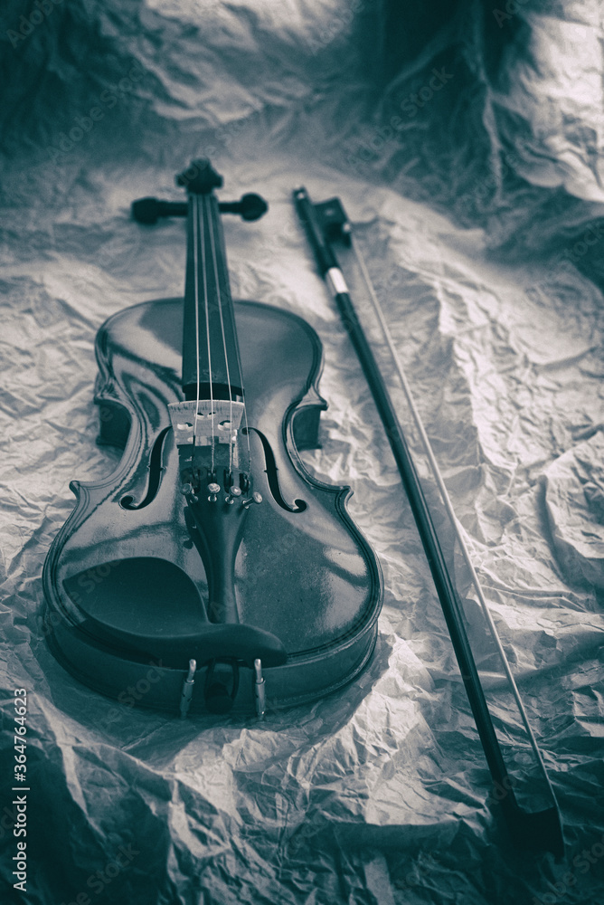 The abstract art design background of wooden violin  put on grunge surface background,black and white tone