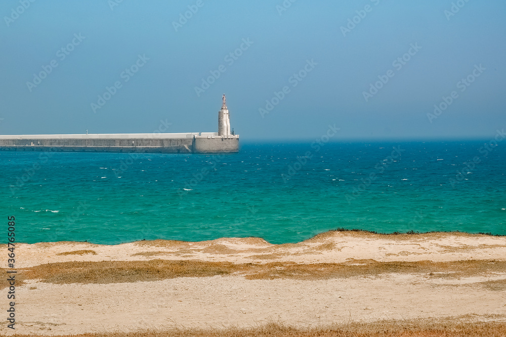 lighthouse in the sea, tarifa