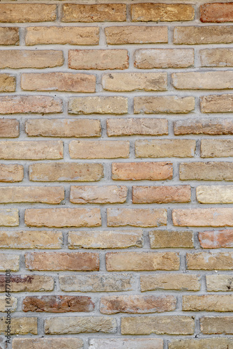 Wall of old bricks - background