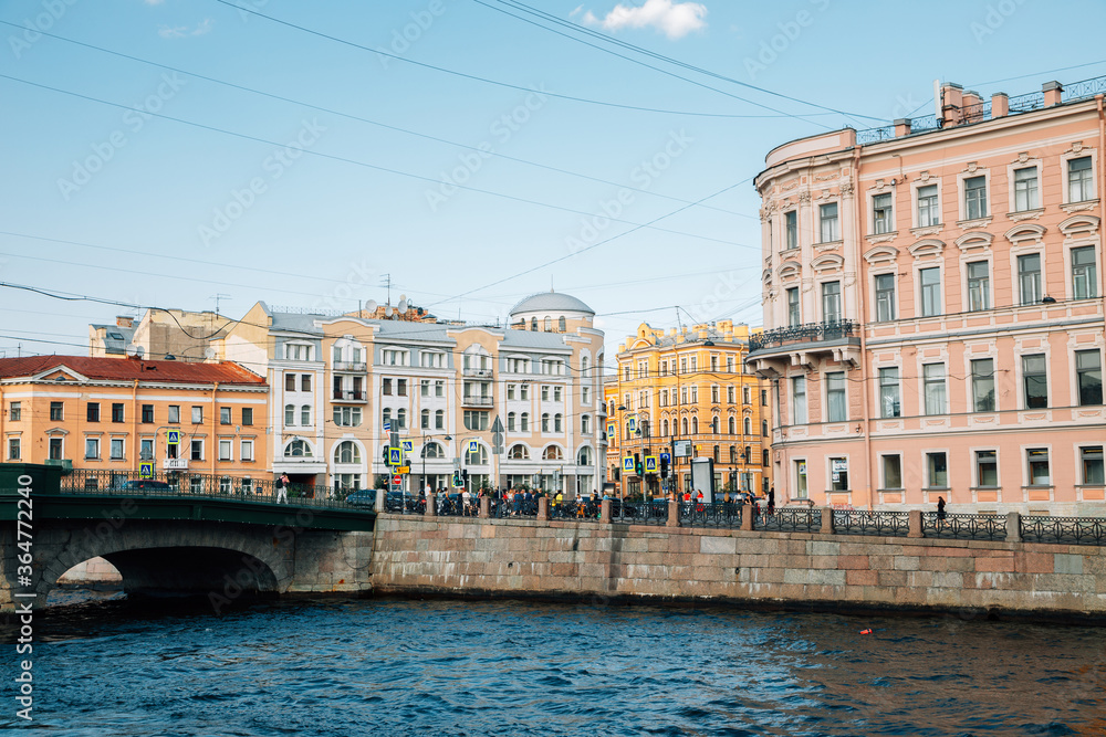 Belinsky Bridge and Medieval buildings with Fontanka River in Saint Petersburg, Russia