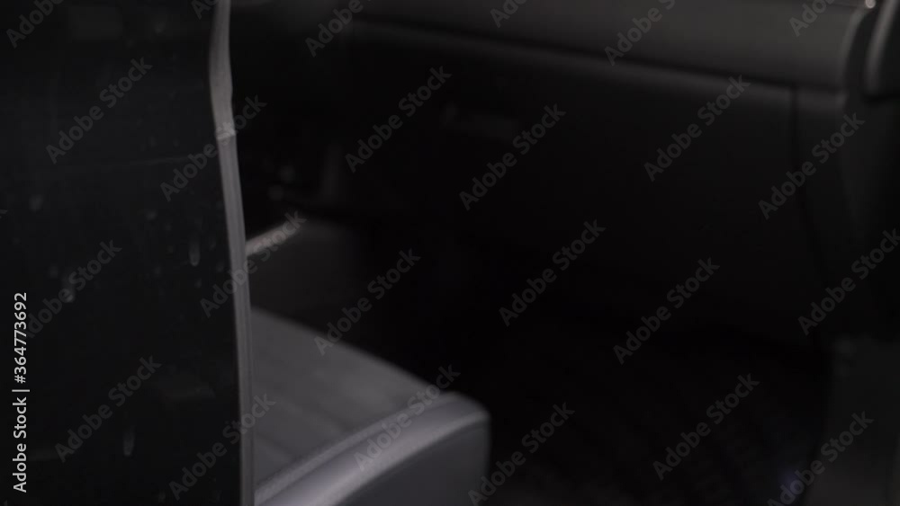 Hand opening the door of a car and then closing it. Closeup on the door handle of the vehicle. Hand opening the door of a car and then closing it. Closeup on the door handle of the vehicle.