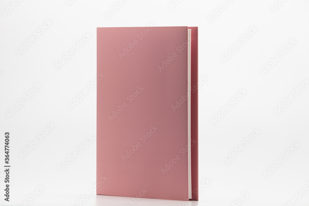 Pink Hardback Book With Copy Space Isolated on White Background Pink Hardback Book With Copy Space Isolated on White Background