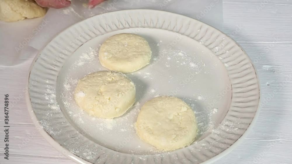 Chef hands kneading dough for homemade cakes Chef hands kneading dough for homemade cakes