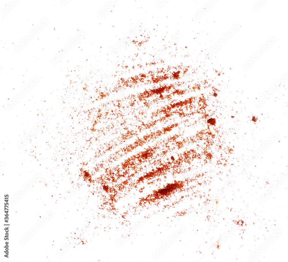 Obraz premium Powdered red paprika on white background isolation, top view
