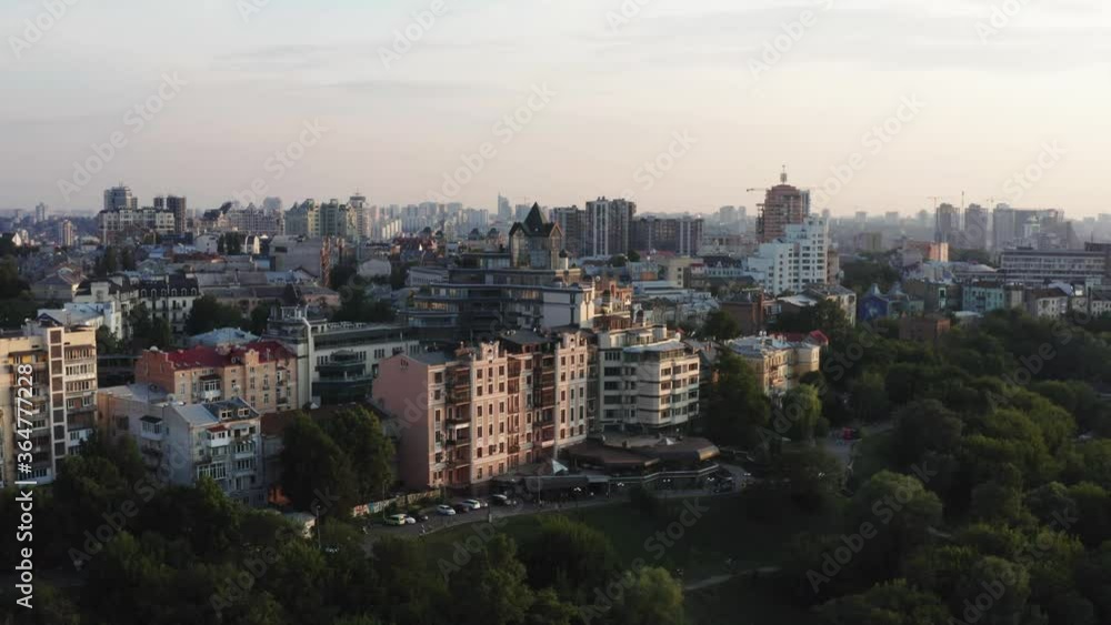 Aerial view of the city at sunset, low houses Aerial view of the city at sunset, low houses