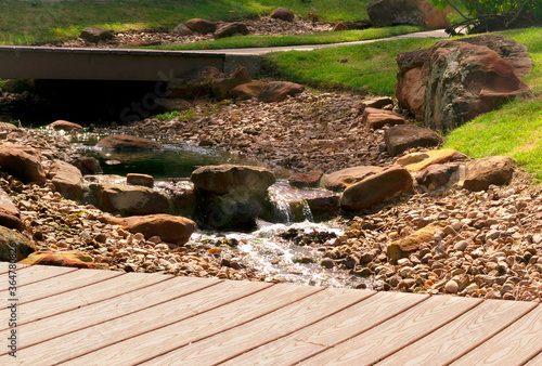 small stream over rocks at a community park in Conroe, TX.