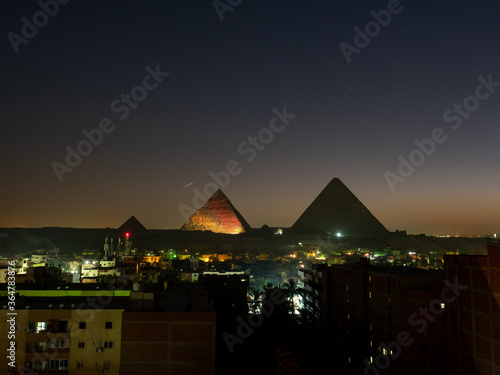 pyramid in giza at night, partly illustrated