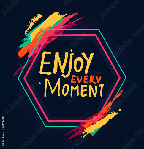 Inspirational or motivational phrase. Enjoy every moment inside pentagon with colorful brush strokes. Inscription with hand drawn text calligraphy. Typography slogan for clothing or stickers, or logo