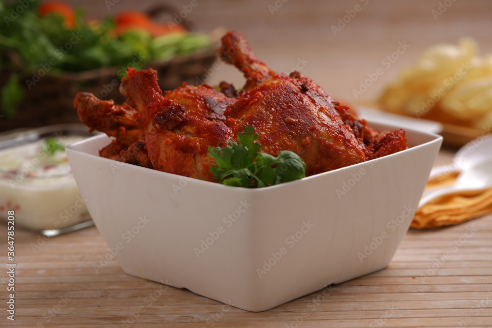 Tandoori chicken_wooden background Stock Photo | Adobe Stock
