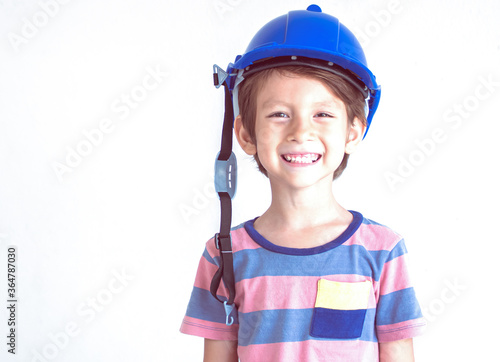 Portrait of little boy pretending to be Engineer