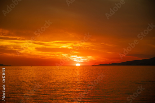 Sunset over the sea of Mykonos © vasser