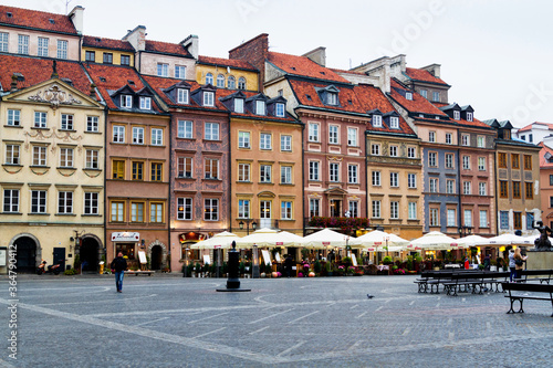 WARSAW, POLAND - OCTOBER 19, 2016 ; Beautiful Tenement houses on the street Nowomiejska and street Freta, Old Market Square photo