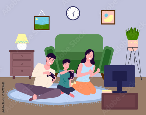 Family plays video games together on the carpet in the living room. Sharing a fun time during quarantine. Spending good time. Home fun activities. A cozy living room. Stay at home and be safe