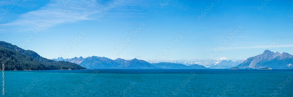 view of the snowy mountains and sea in Alaska