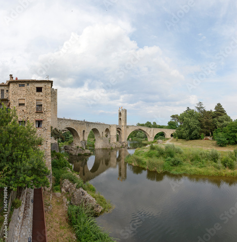 Old bridge across Fluvia River in Besalu, Catalonia, Spain.