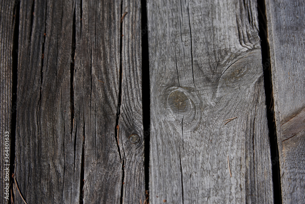 Natural background of old boards and old nails inside
V Natural background of old boards and old nails inside
V