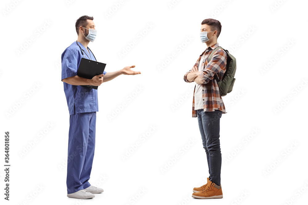 Medical worker with a face mask talking to a guy with mask Medical worker with a face mask talking to a guy with mask