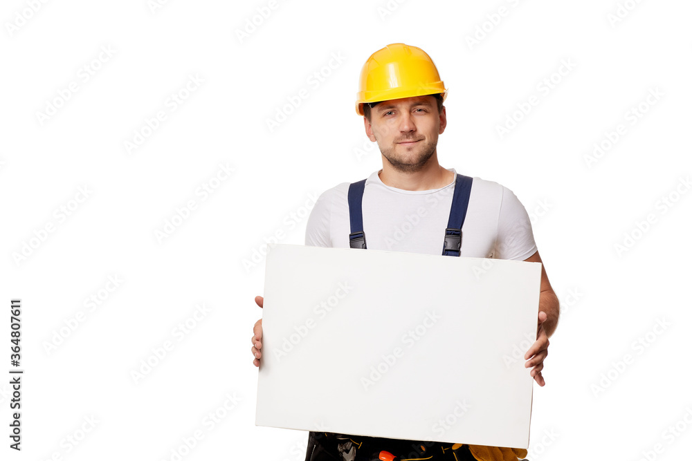 caucasian repairman worker in uniform and hard hat holding empty blank board on white background caucasian repairman worker in uniform and hard hat holding empty blank board on white background