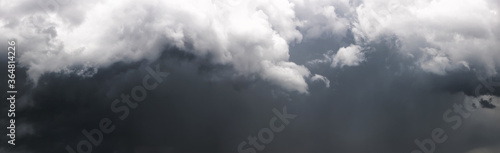 Photography Panorama of the dark stormy sky with gray clouds
