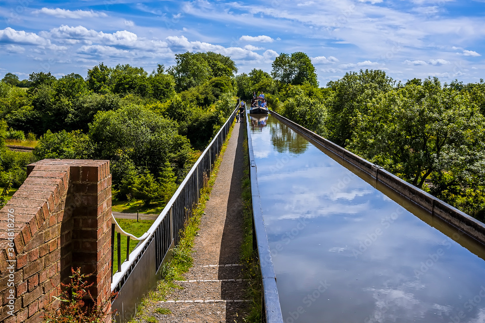 A view looking towards a canal boat on the Edstone Aqueduct, Warwickshire, the longest aqueduct in England