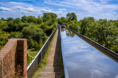 A view looking towards a canal boat on the Edstone Aqueduct, Warwickshire, the longest aqueduct in England