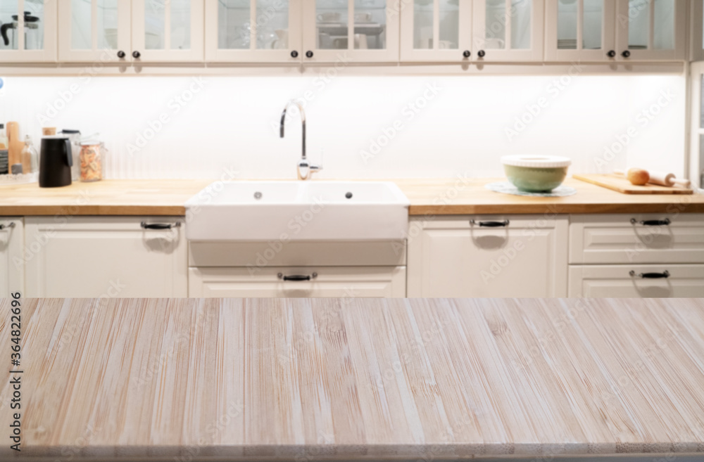 Fototapeta premium Wood table top on blur kitchen room