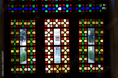 Stained glass window in a Fin Garden, Kashan, Iran, Middle East, Asia photo