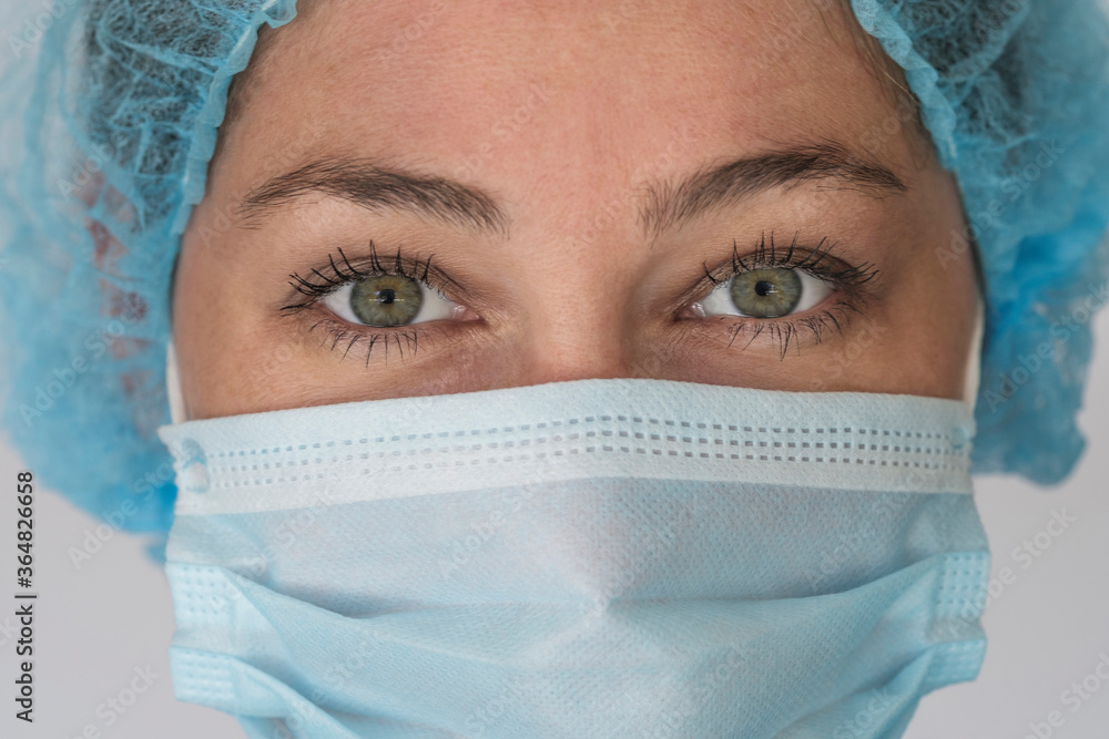 Portrait of nurse in face mask Portrait of nurse in face mask